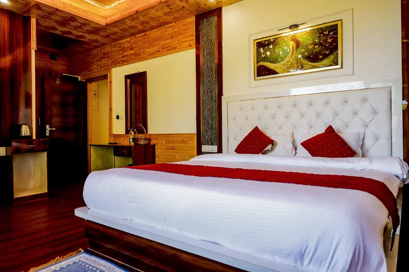 Chandelier room: bed with white tufted headboard