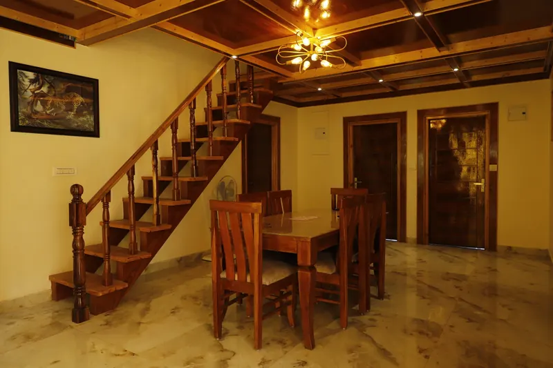 Staircase rising from the dining hall